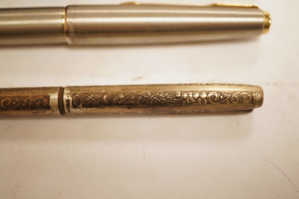 A Sheaffer 'White Spot' fountain pen with 14K gold nib and chevron decoration and three other pens